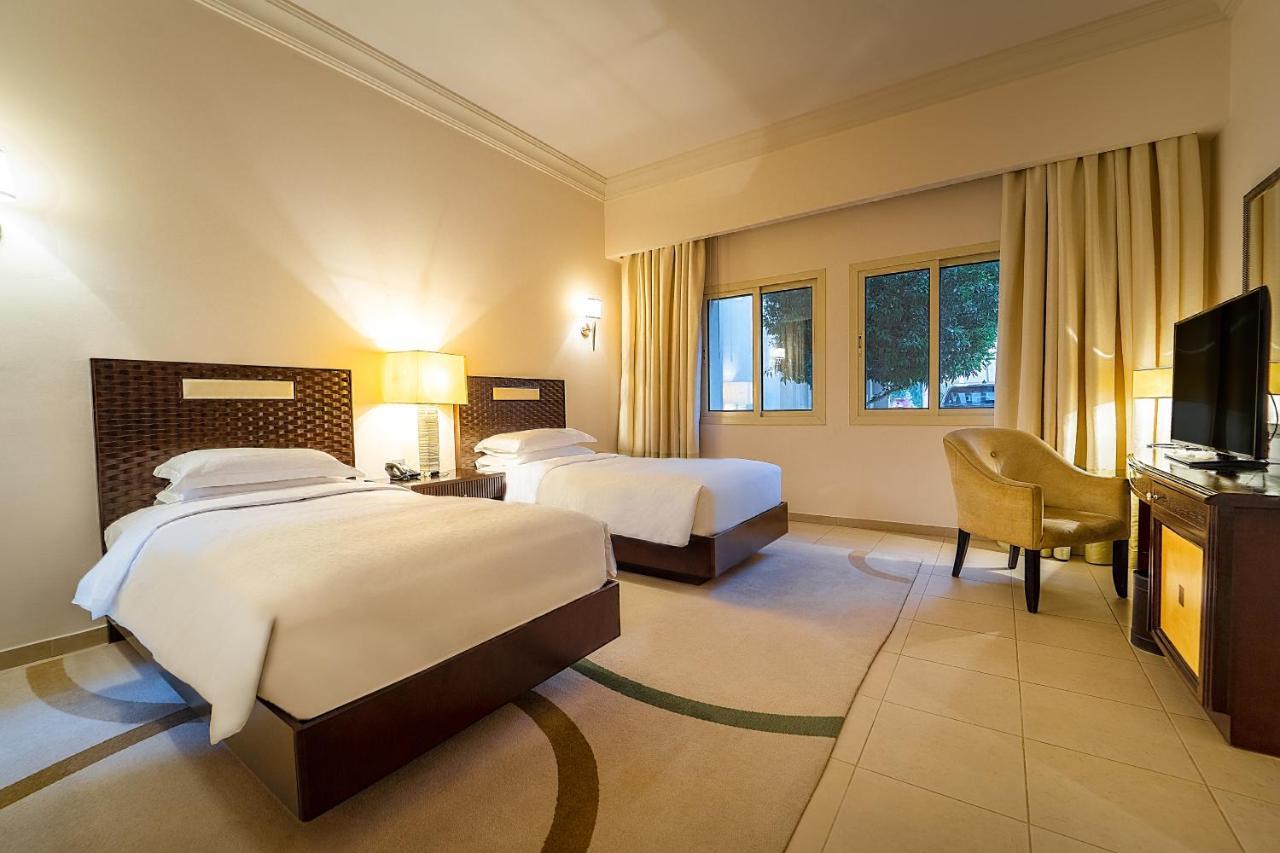 Grand Hyatt Doha Hotel & Villas Экстерьер фото A room at the hotel