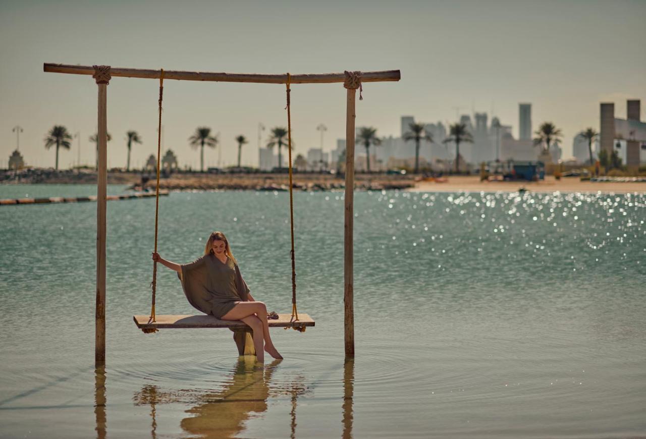Grand Hyatt Doha Hotel & Villas Экстерьер фото The Swing